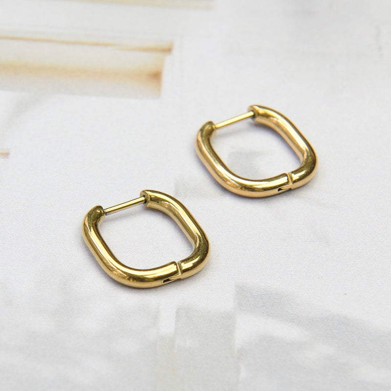 Vierkante gouden creolen oorbellen met ronde vorm