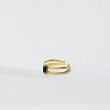 Bolle agaat zwarte steen met gouden bewerkte ring